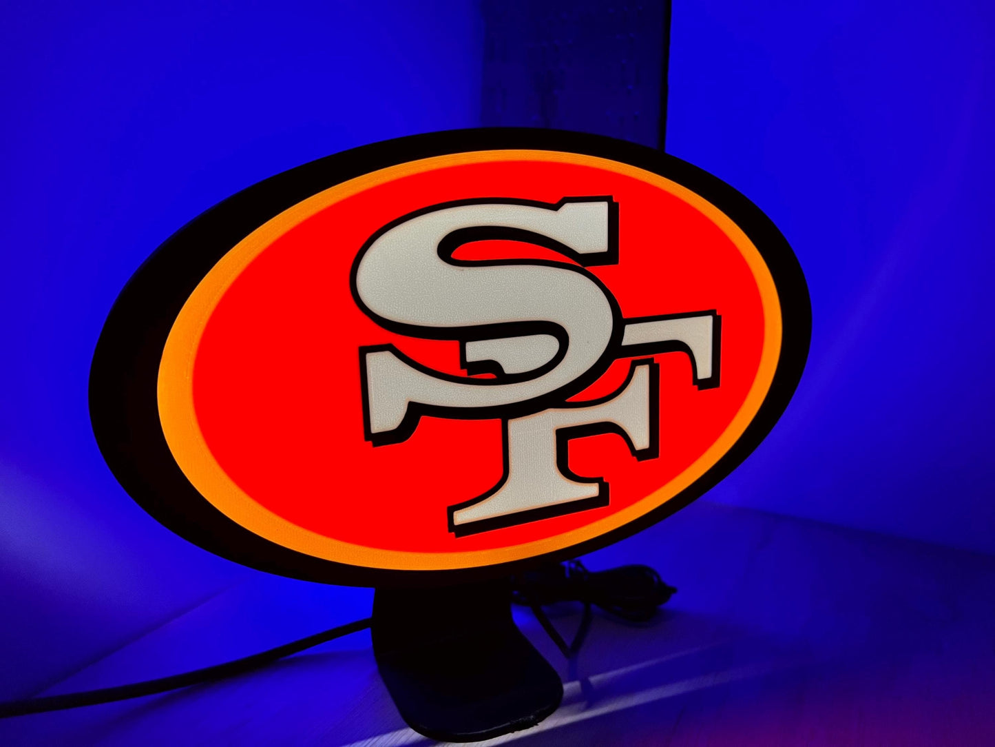 a neon sign with the word san francisco on it