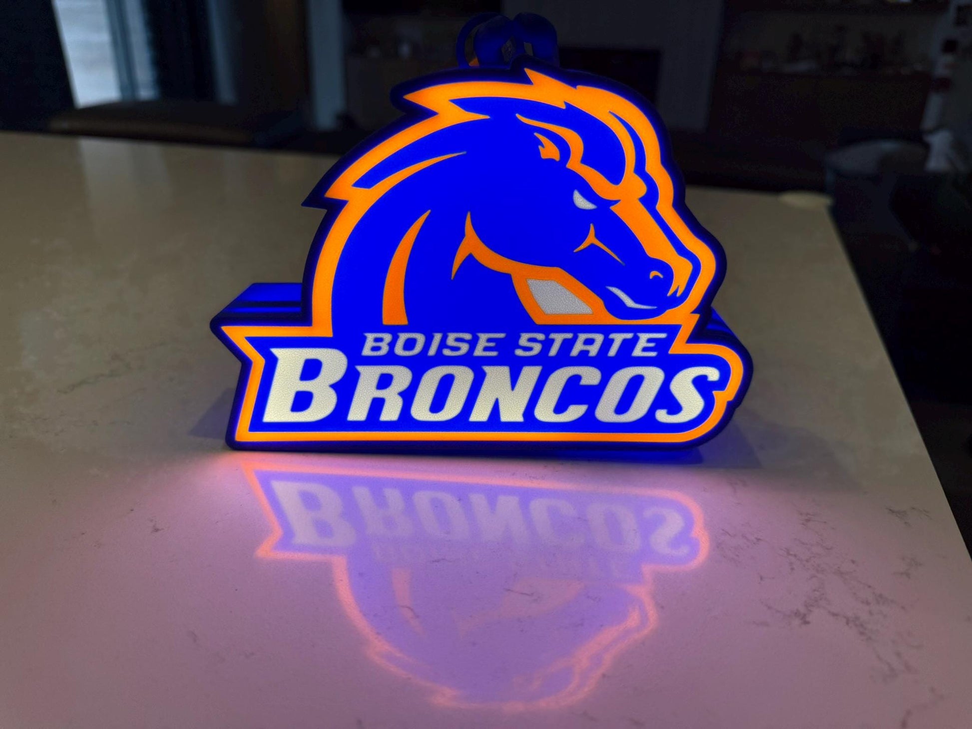 the boise state bronco's logo on a table