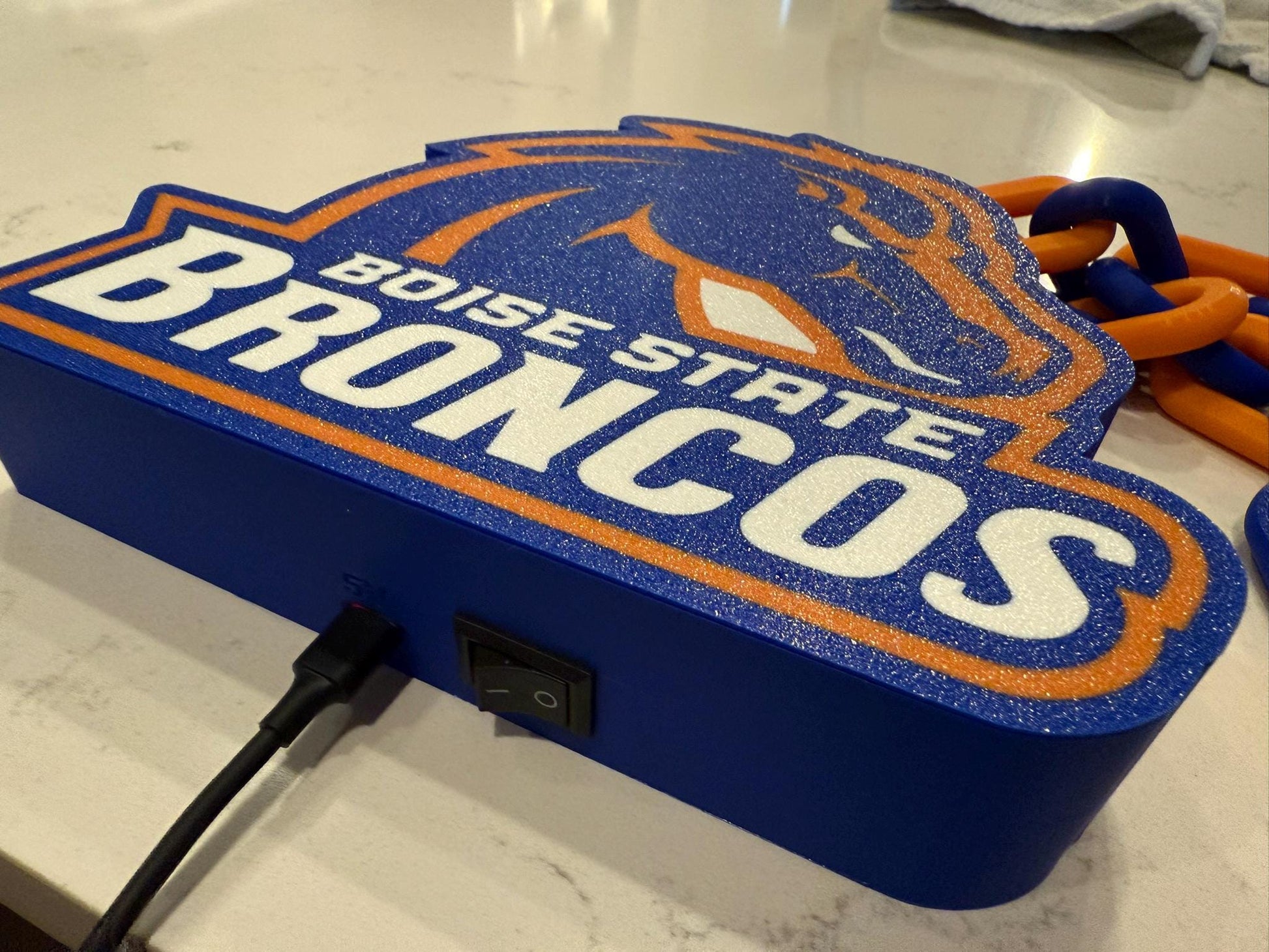 a boise state bronco's logo on a table
