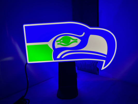 a lamp with a seattle football logo on it