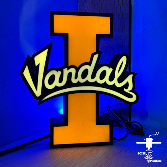 a neon sign with the letter i on it