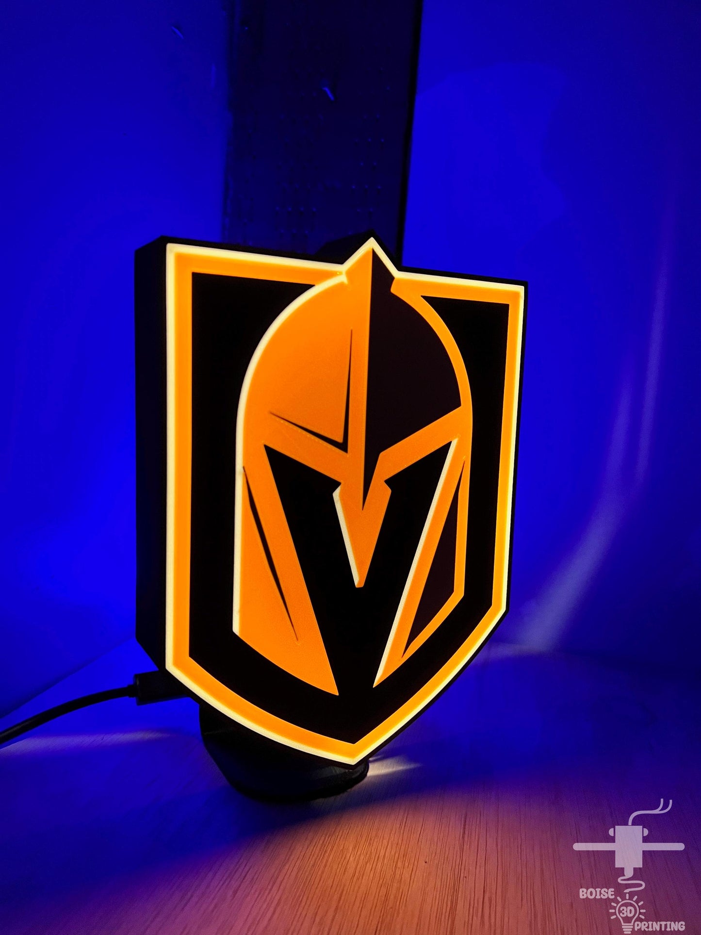 a close up of a logo on a wall