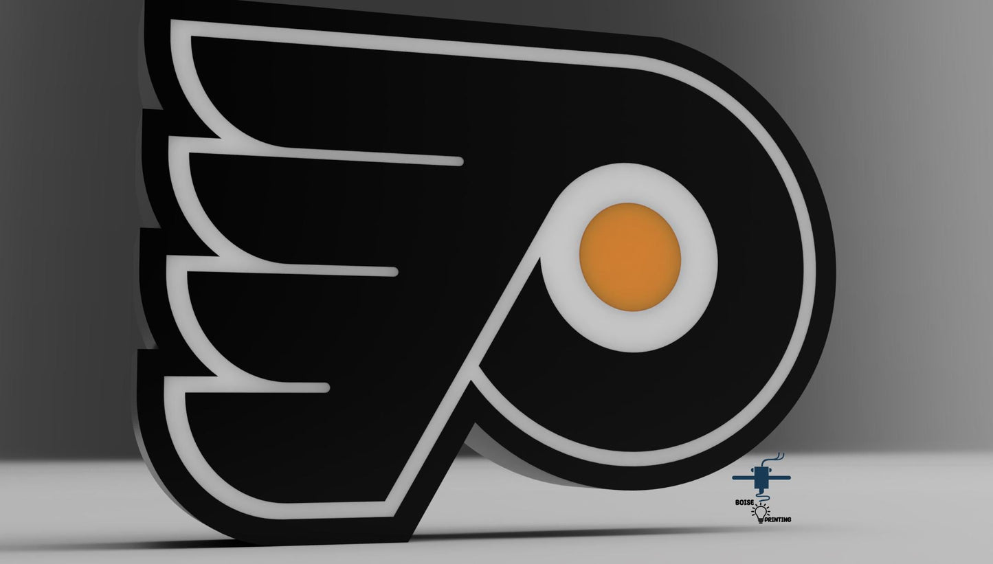 a close up of a logo on a hockey puck